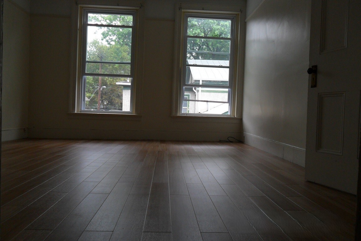 Bedroom - new floor - 210 N Geneva St