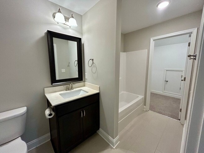 Building Photo - Spacious 3 bed, 3 bath home in Groves Park Commons featuring a modern kitchen, 2-car garage, and ...