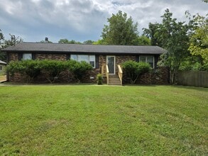 Building Photo - FOR LEASE Charming All-Brick Home on 1 Acr...