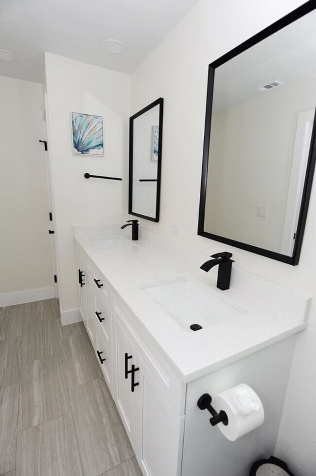 Building Photo - ANNUAL RENTAL Naples Park 3 Bedroom // 2 Bathroom Single Family Home