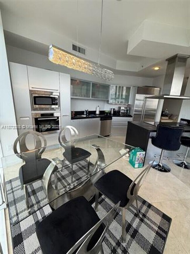 Building Photo - 18201 Collins Ave