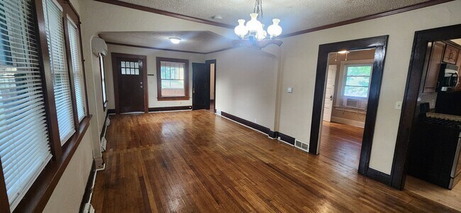Building Photo - Fully fenced yard with stainless steel appliances including gas stove!