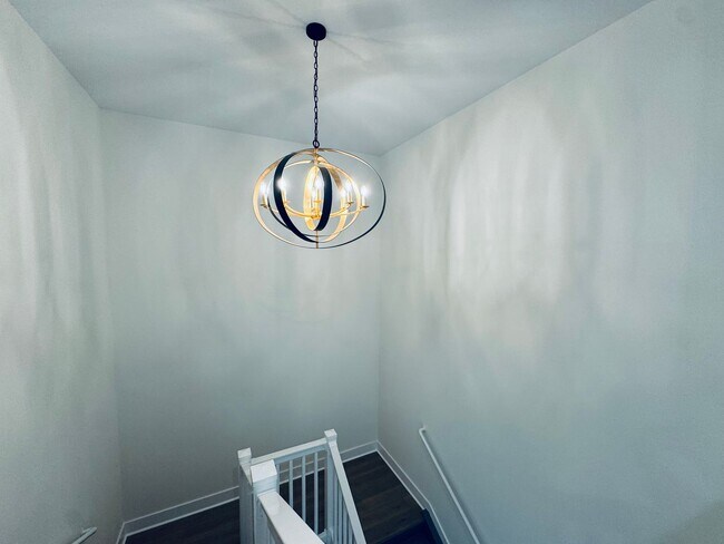 Building Photo - Brand New Luxury Condo - Top Floor