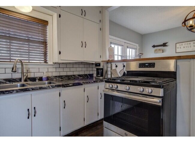 Building Photo - Charming Home in Tech Terrace – Updated & ...