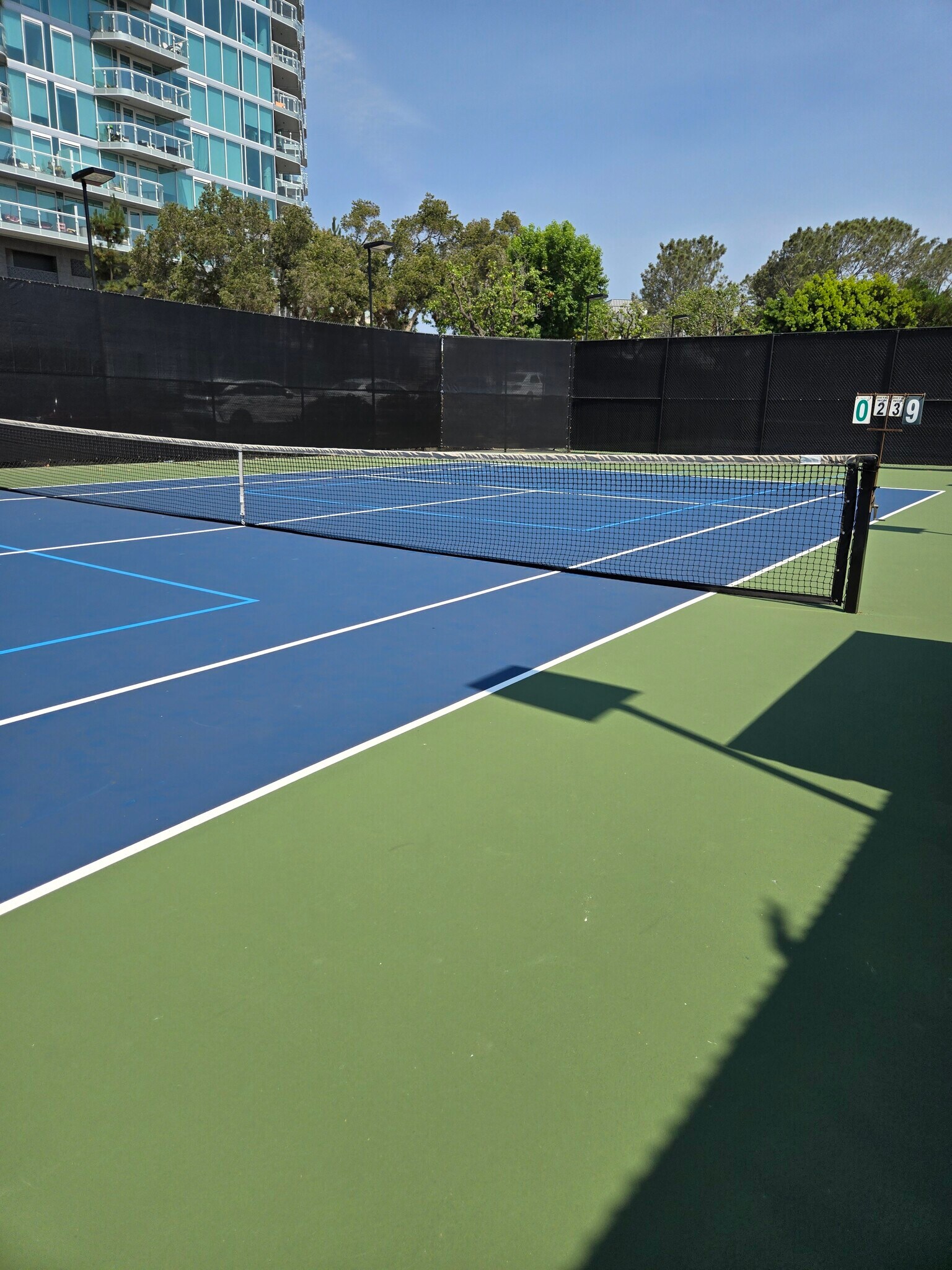 1 of the tennis courts has 2 pickleball courts added to the playing area - 8830 Via Andar
