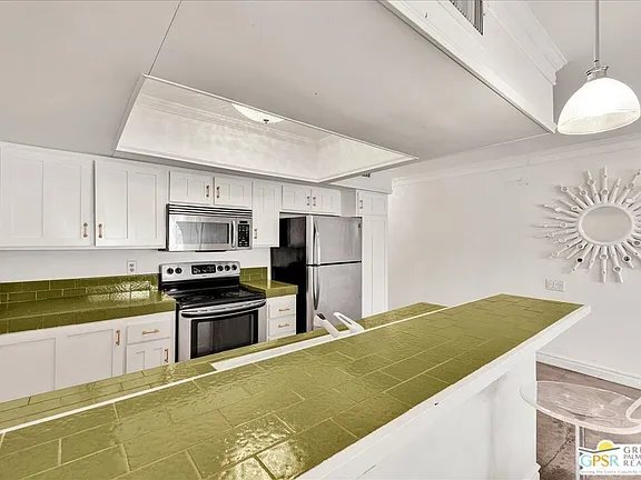 Building Photo - 1655 E Palm Canyon Dr