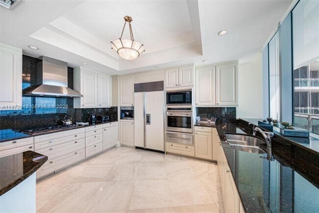 Building Photo - 10295 Collins Ave