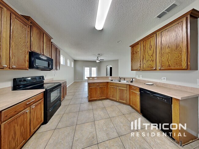 Building Photo - 14308 Tanja King Blvd