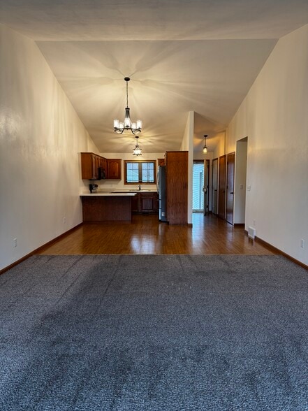 Livingroom View of Dining Area and Kitchen - 3719 S Berryfield Ln