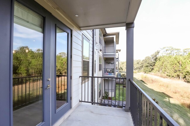 Building Photo - RARE 3 BEDROOM 2 BATH CONDO AT THE INLET -...