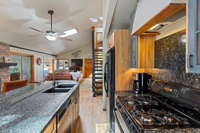 Building Photo - Garage! Pets negotiable! Multiple living spaces!  Available to see on 5/12!