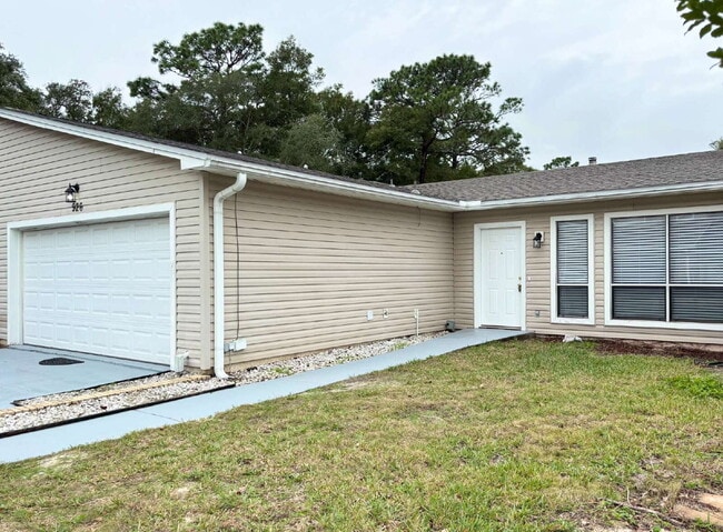 Building Photo - "Charming 2-Bed Oasis with Granite Touches & Cozy Fireplace in Fort Walton Beach!"