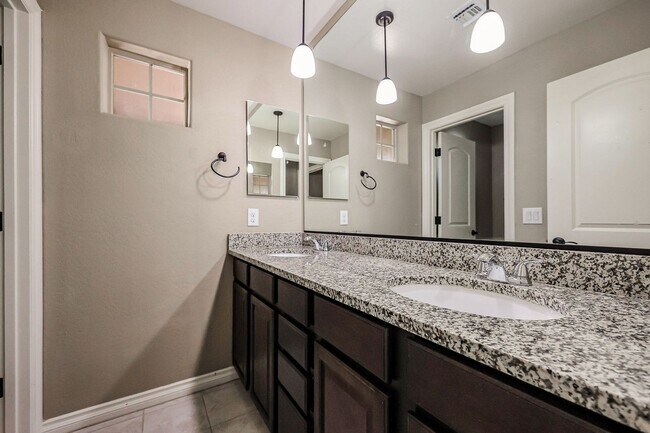 Building Photo - COMING SOON! Great Location!Stunning 6-bedroom Plus 7, 4.5-bathroom home located in Chandler