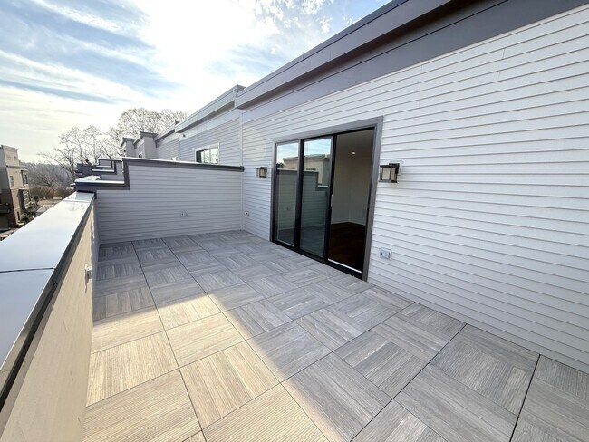 Building Photo - Brand new 4 level, 4 Bedroom Townhome with Elevator!