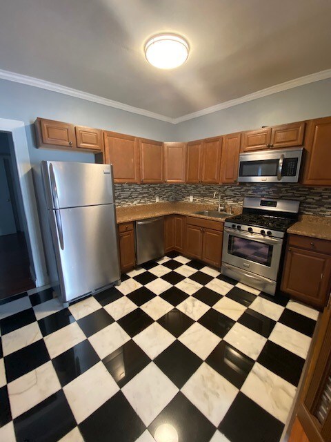 kitchen with stainless steel appliances - 109 Lexington Ave