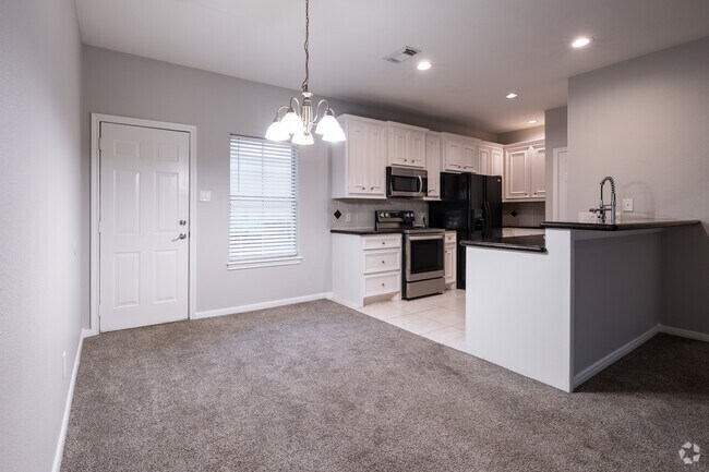 Building 1- 2BR,2BA - 1,095SF - Dining Room - Willis Snow Properties, LLC