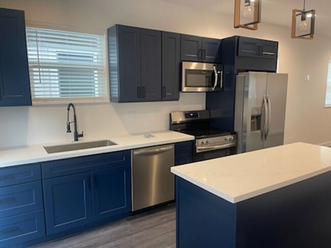 Building Photo - Brand new 2 bed/2 bath, central a/c, dishwasher, washer & dryer, deck & patio!