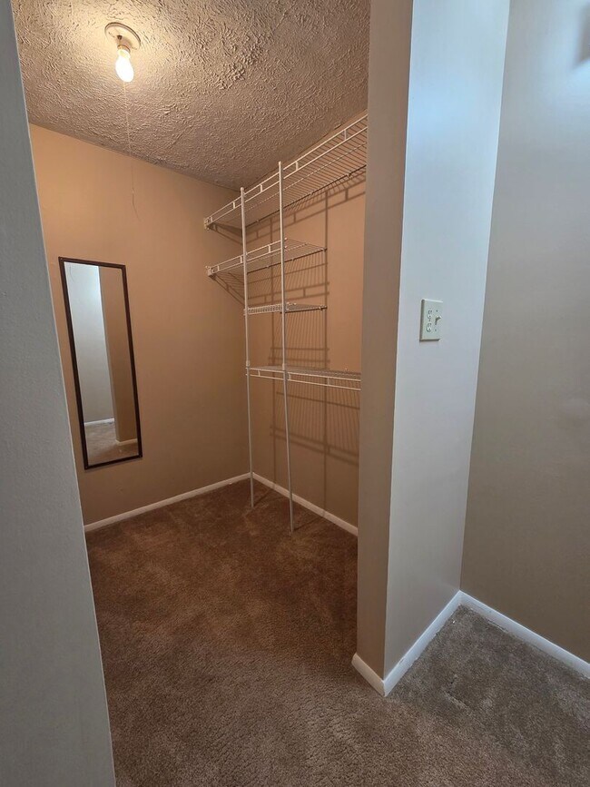 Building Photo - Serene Living in a Quiet Lakeside Community