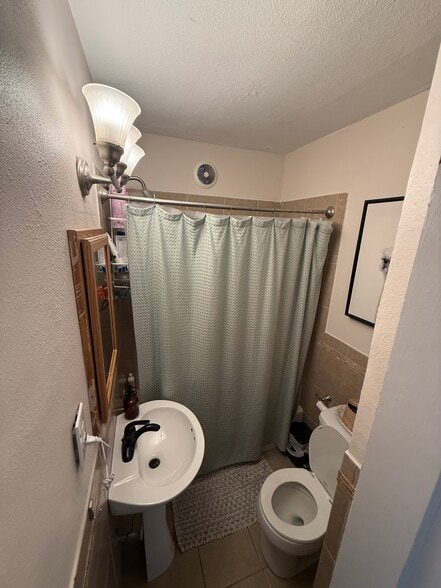First floor Bath with tub/shower - 2827 Wood St