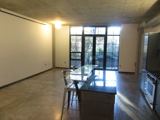 Building Photo - Streetcar Lofts - studio with 1 parking sp...