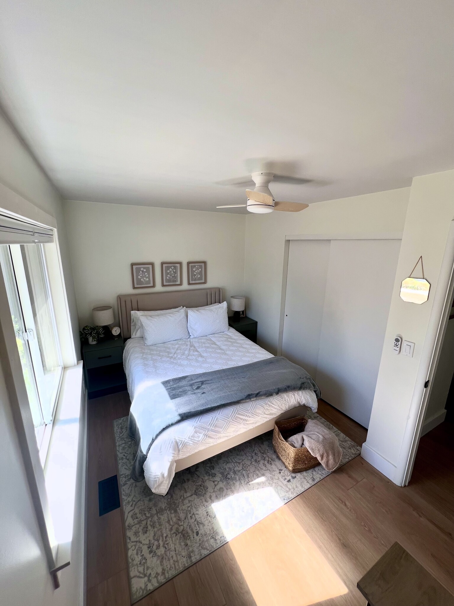 Guest bedroom #2 with closet, lamps, nightstands, a ceiling fan and work space - 920 Oak St