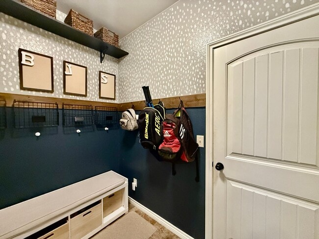 Building Photo - Spacious & Stylish 5-Bedroom Home in Wolf ...