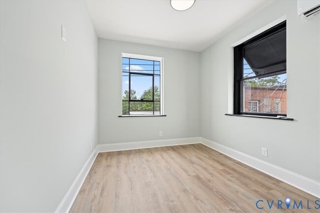 Building Photo - 207 E Broadway