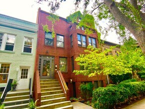 Building Photo - SAVE OVER $200!* Dupont Circle 1 Bedroom Charmer with Patio, Fireplace, Central Air, Washer/Dryer!