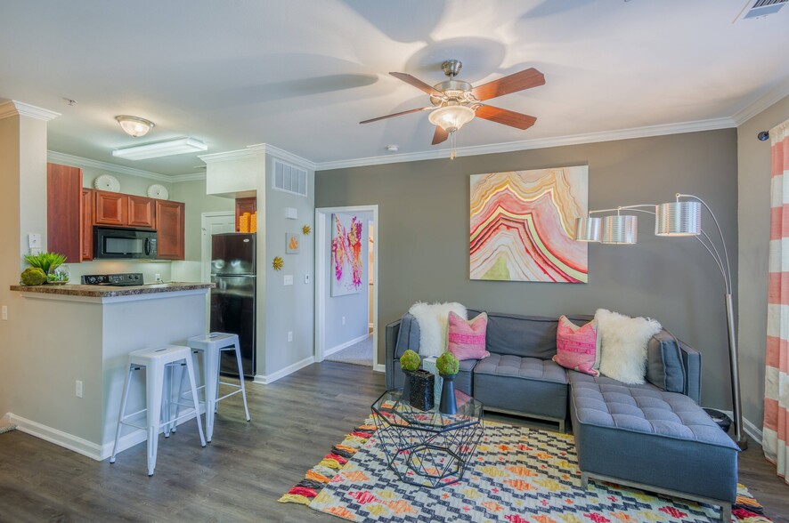 Spacious Living Room and Kitchen - Sixteen50 at Lake Ray Hubbard Apartments