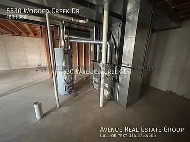 Building Photo - 5530 Wooded Creek Dr
