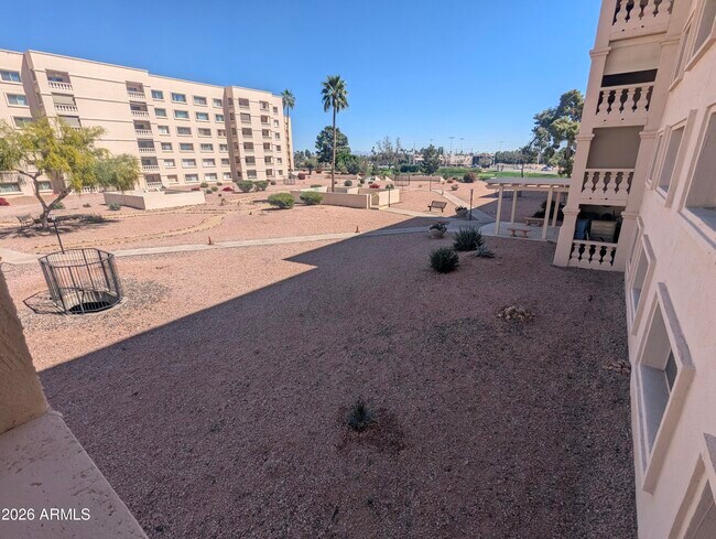 Building Photo - 7910 E Camelback Rd