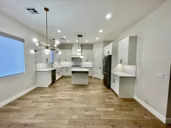 Building Photo - Lovely Four-Bedroom in Ivins with 3-Car Garage and Small RV parking Has Lots of Upgrades