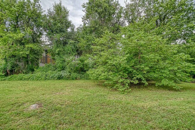 Building Photo - Newly Remodeled Campus Property! Lawn Care Included!