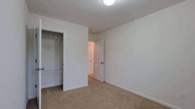 Building Photo - "Modern 3-Bedroom Multiplex with 3 Full Ba...