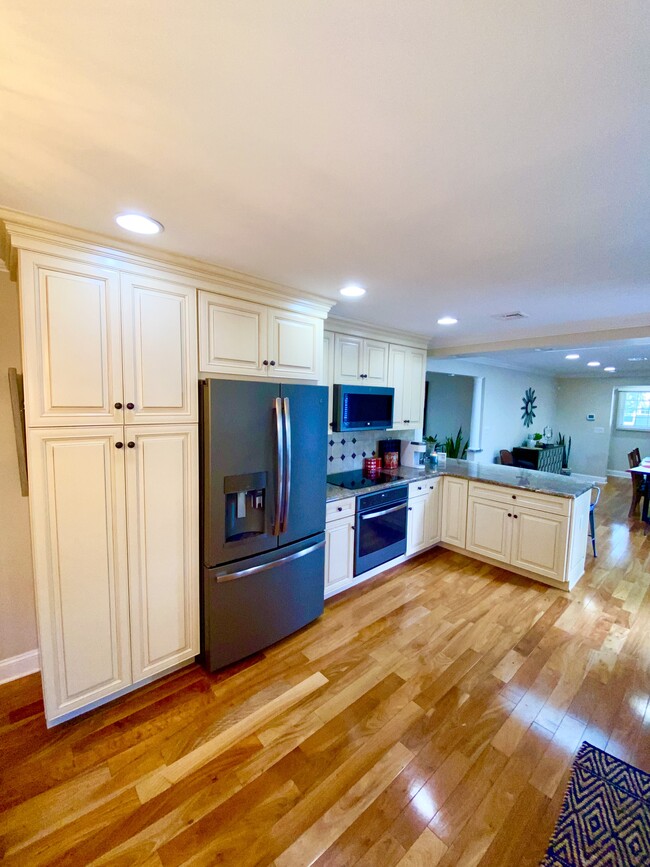 Kitchen with induction stove - 1400 Camp Ave