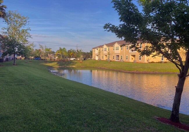 Building Photo - Spacious 3-Bedroom Condo with Pond Views &...