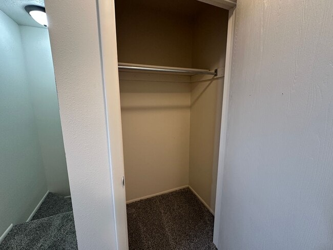 Building Photo - Spacious, three level, 4 Bed 2.5 bath Townhome in Ammon right behind the Walmart on Hitt.