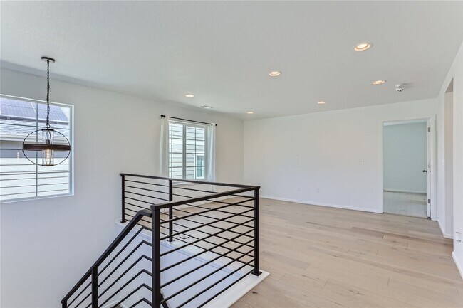 Building Photo - 3-Bedroom Home with Open Floor Plan, Private Balcony & Attached Garage