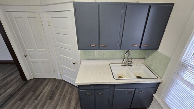 Building Photo - Spacious 3BR/1BA First-Floor Home with Garage & Fenced Yard in Quiet Michigan City Neighborhood