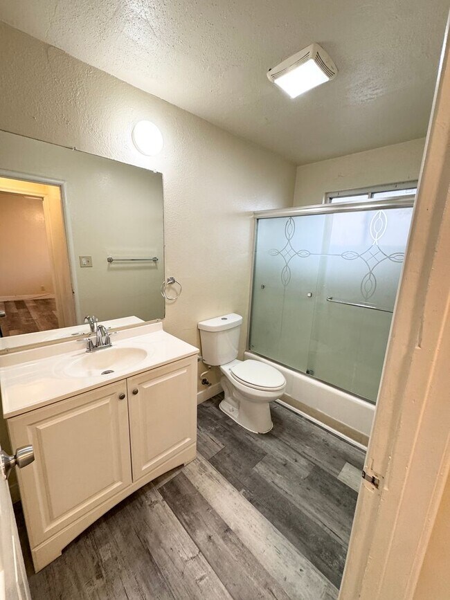 Building Photo - Move-In Special; Downstairs One Bedroom + Private Patio – Available Now! SEE VIDEO