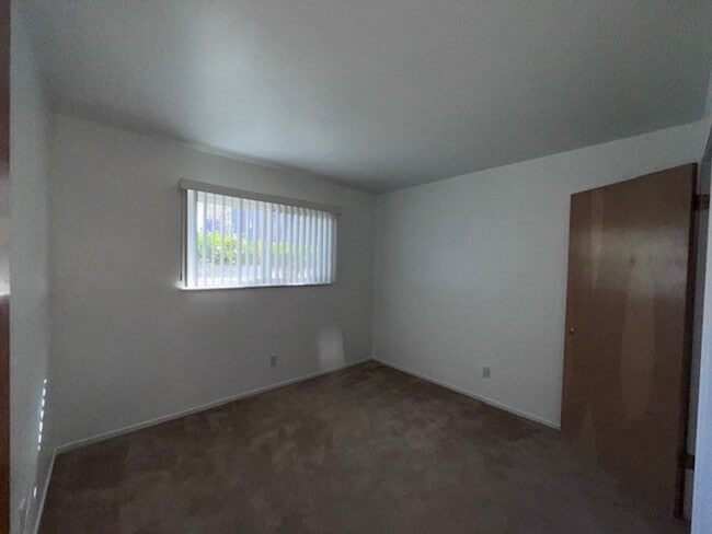 Building Photo - Freshly painted home with large backyard. ...