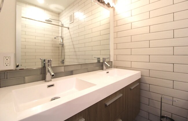 Building Photo - Modern 2BR/1.5BA Two-Level Condo w/ Patio ...
