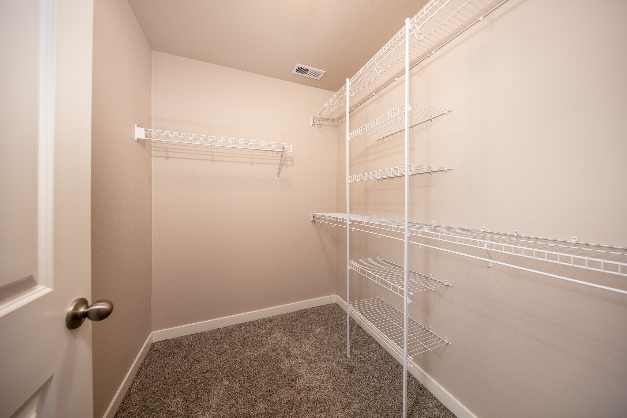 master walk-in closet - 1295 Windsong Dr