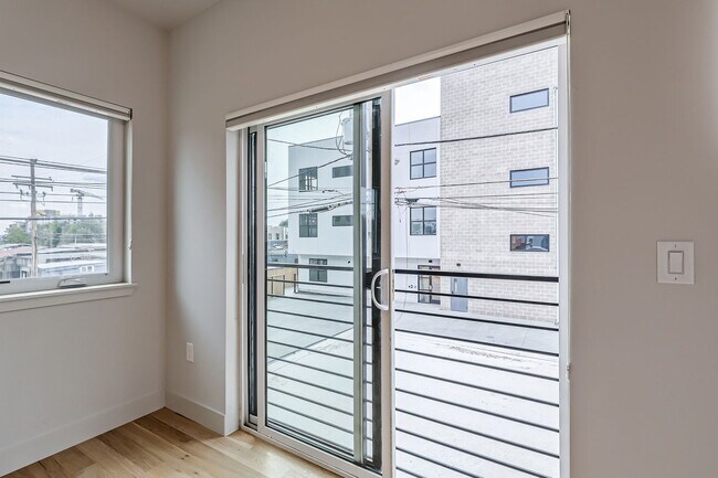 Building Photo - Swanky 1BR – New, Private Garage, Storage,...