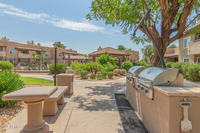 Building Photo - 9450 E Becker Ln