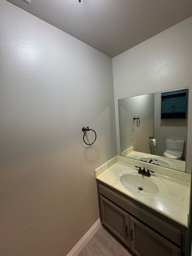 Building Photo - 4-Bedroom Home with Updated Kitchen and Co...