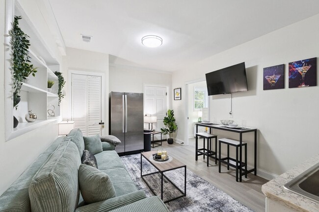 Building Photo - Fully Furnished: Beautiful 4-Bedroom Home ...