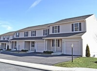 Building Photo - Fantastic Townhome - Pet Friendly (1 pet) with garage and NO MOWING!