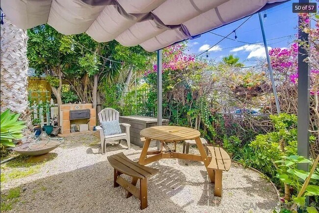 Building Photo - Charming, Fully Furnished Spanish-Style Du...