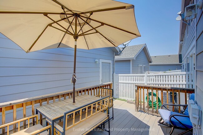 Building Photo - Evolve Real Estate: Beautiful Corner Townhome Available for Move-in on July 21st!